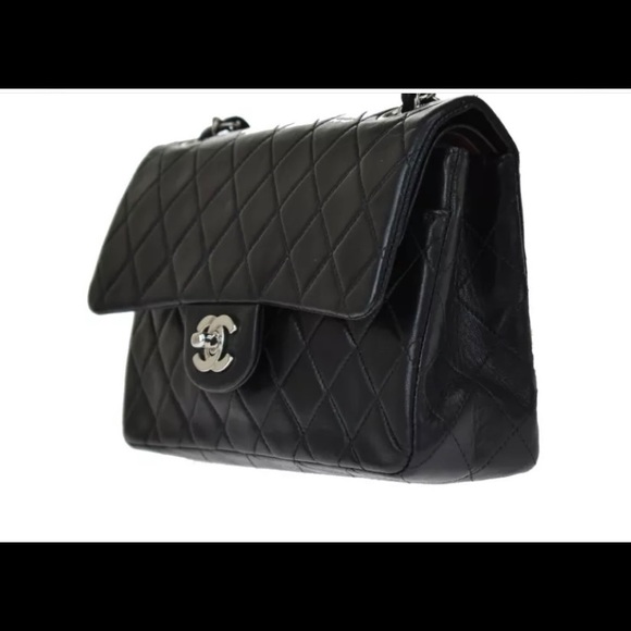 Authentic classic Chanel black double flap handbag with silver hardware. - Picture 2 of 16